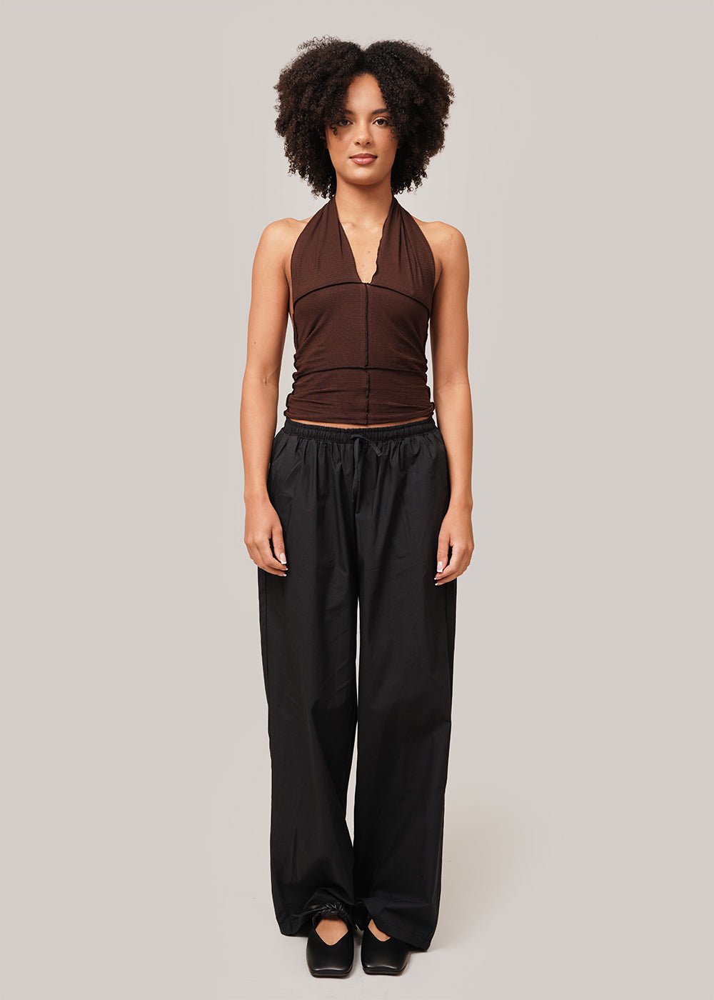 https://newclassics.ca/cdn/shop/products/baserange-cinder-halter-top-new-classics-studios-sustainable-and-ethical-fashion-canada-291541_1000x.jpg?v=1706051529