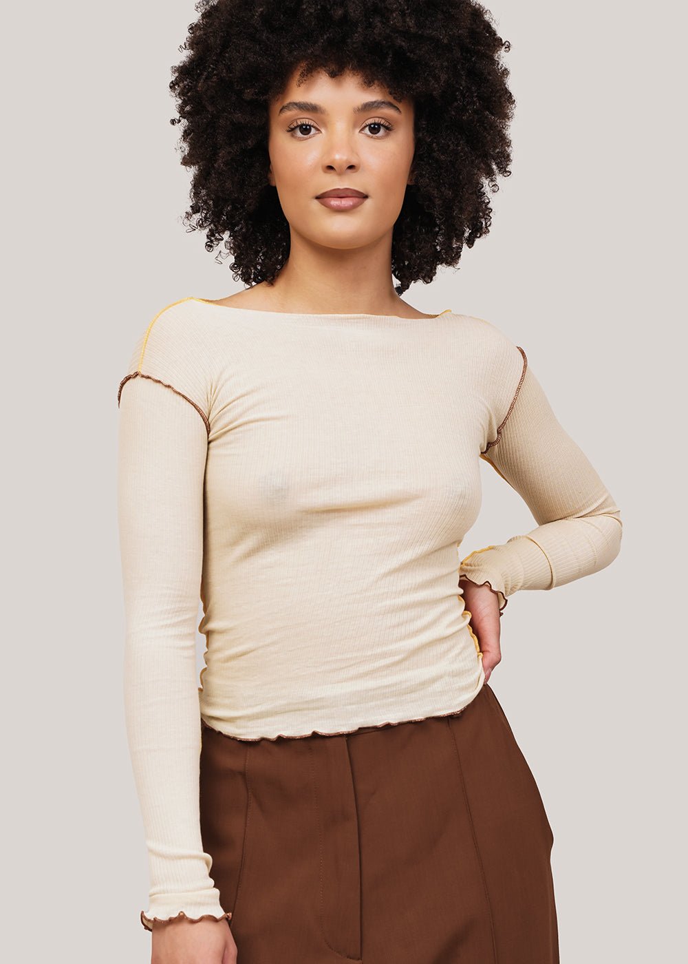 Round Sleeve Cropped Sweatshirt in Beige by AMOMENTO – New Classics Studios