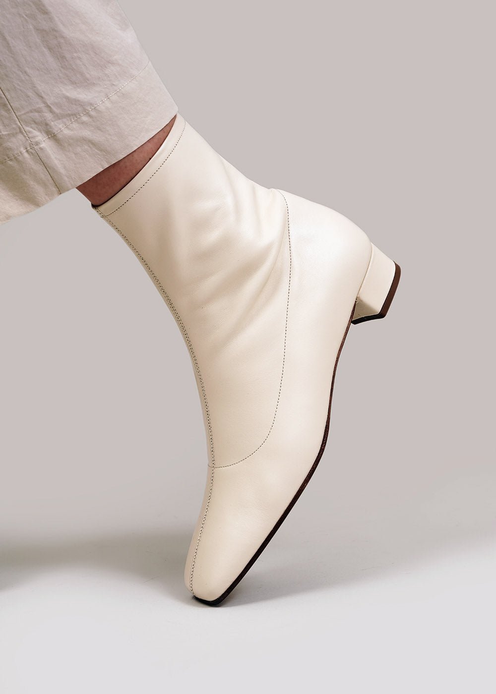Este Boots in White Leather by BY FAR – New Classics Studios