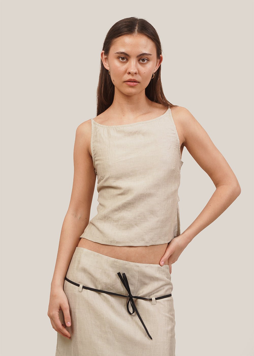 https://newclassics.ca/cdn/shop/products/paloma-wool-haizea-tank-top-new-classics-studios-sustainable-and-ethical-fashion-canada-493176_1000x.jpg?v=1687282027